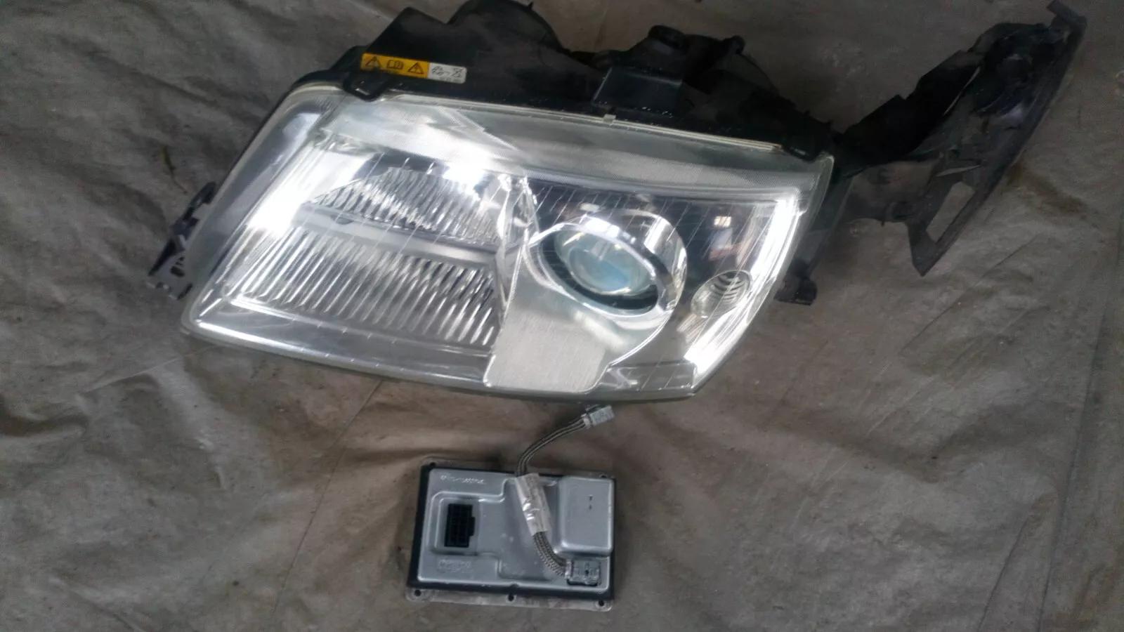 SAAB 9-5 Xenon headlight left original