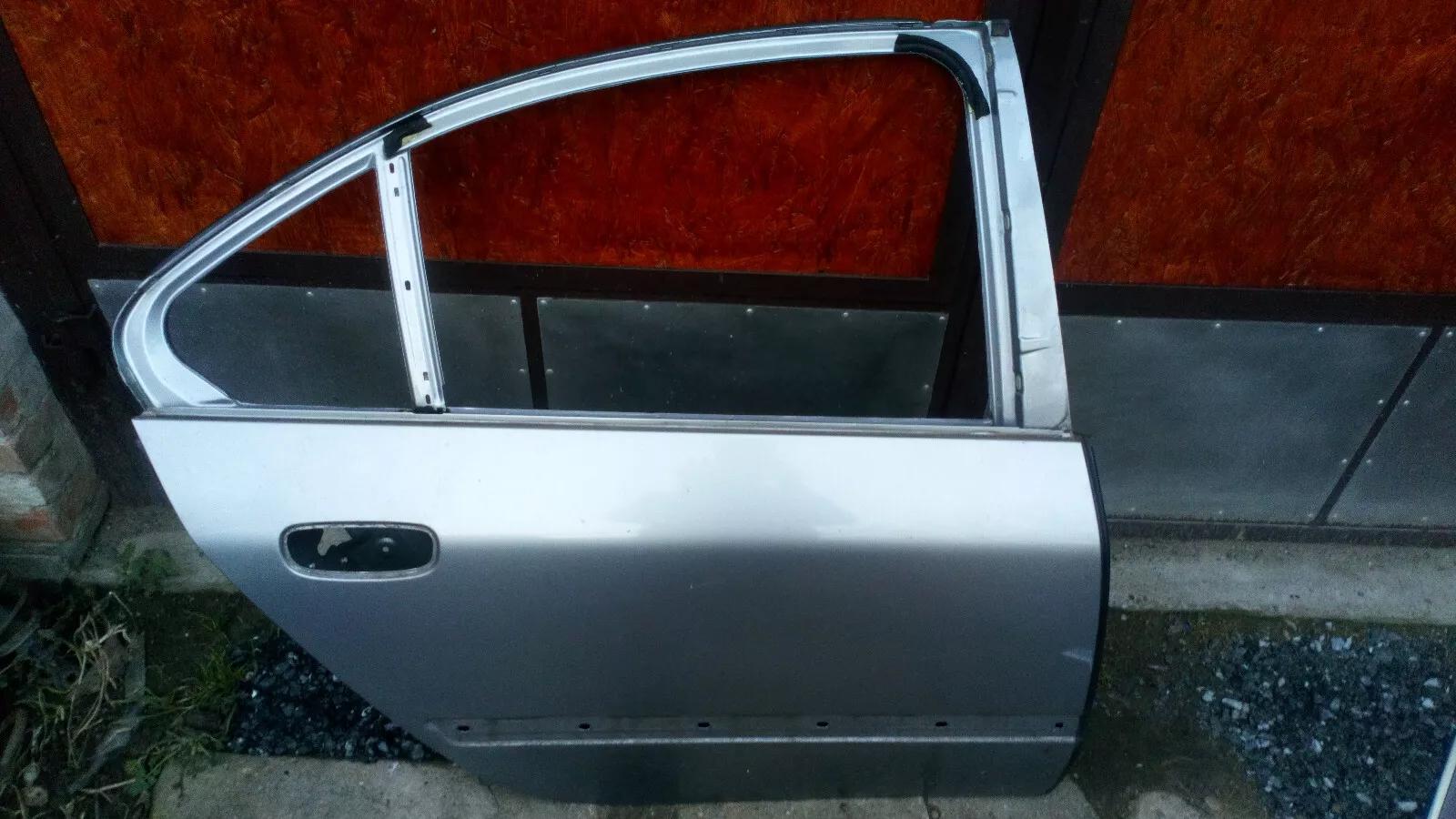 Peugeot 607 door right rear smoked silverYear:2006