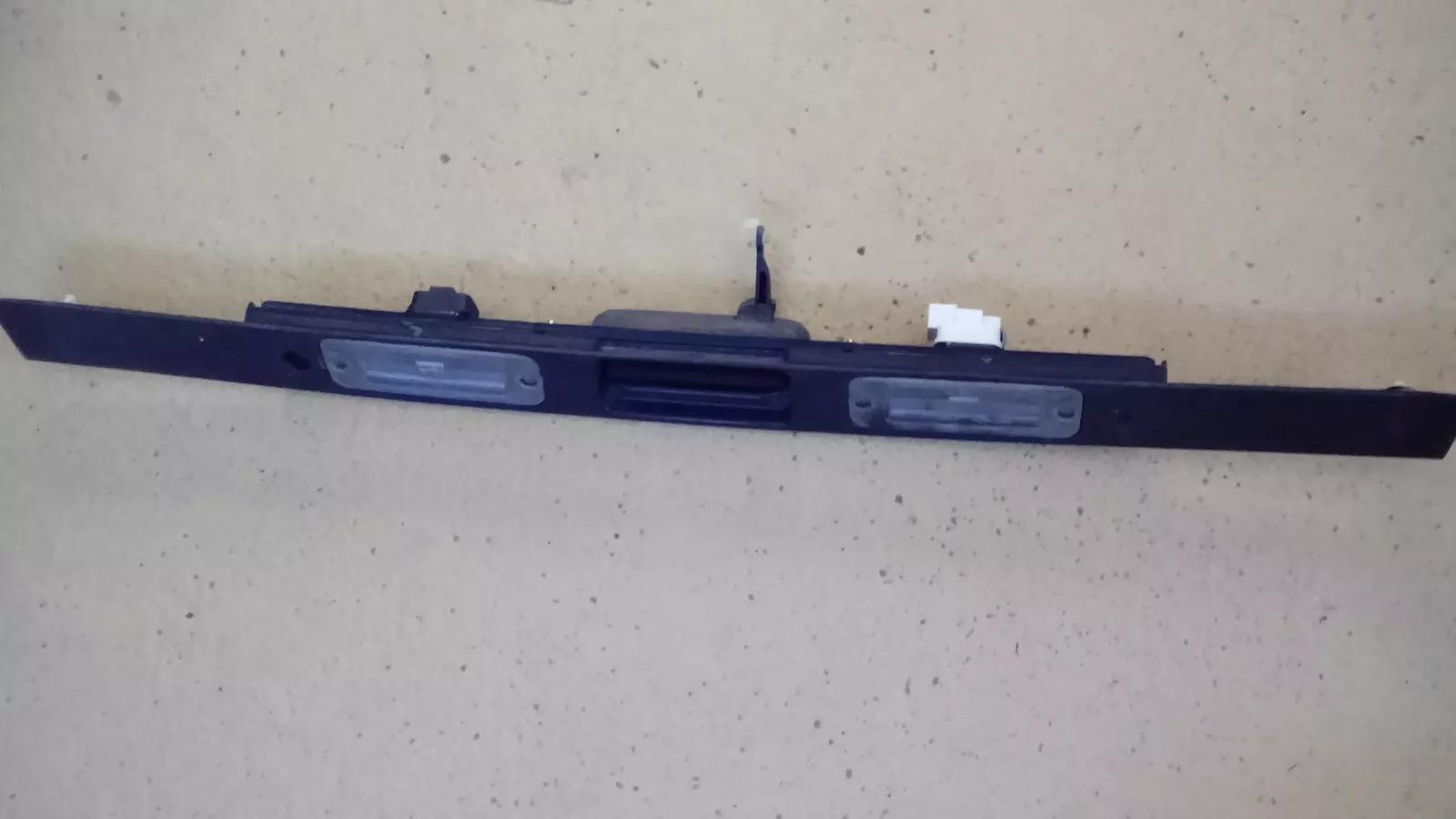 SAAB 9-3 license plate light with outside handle part no: 5409628 year: 2001