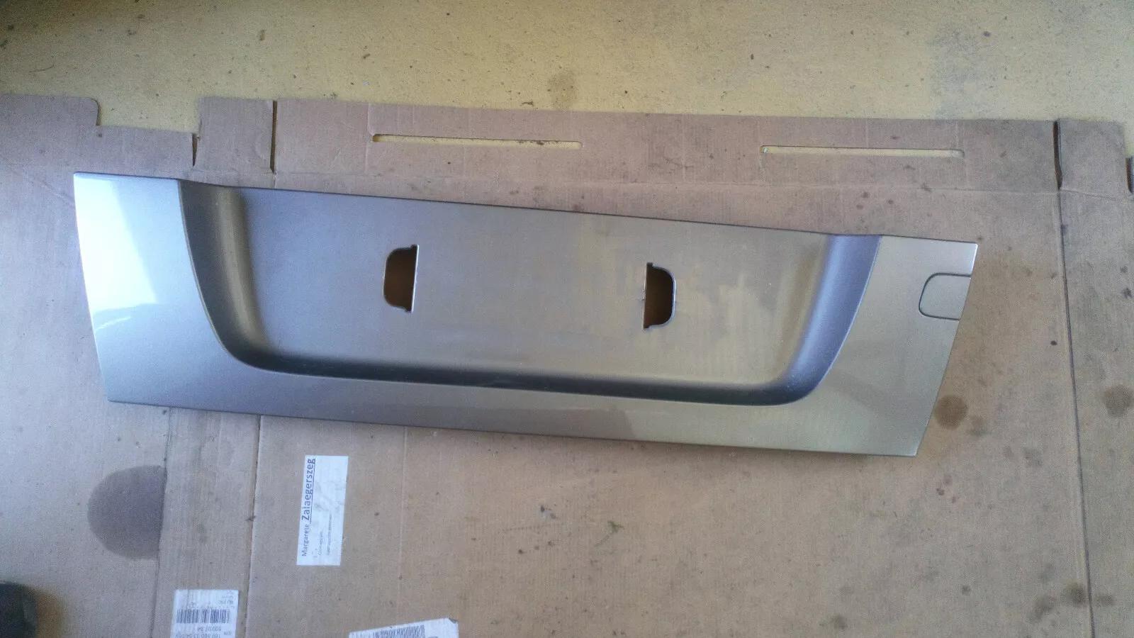 SAAB 9-5 station wagon, rear door trim smoked silver 266 part no:5283619 year:2002